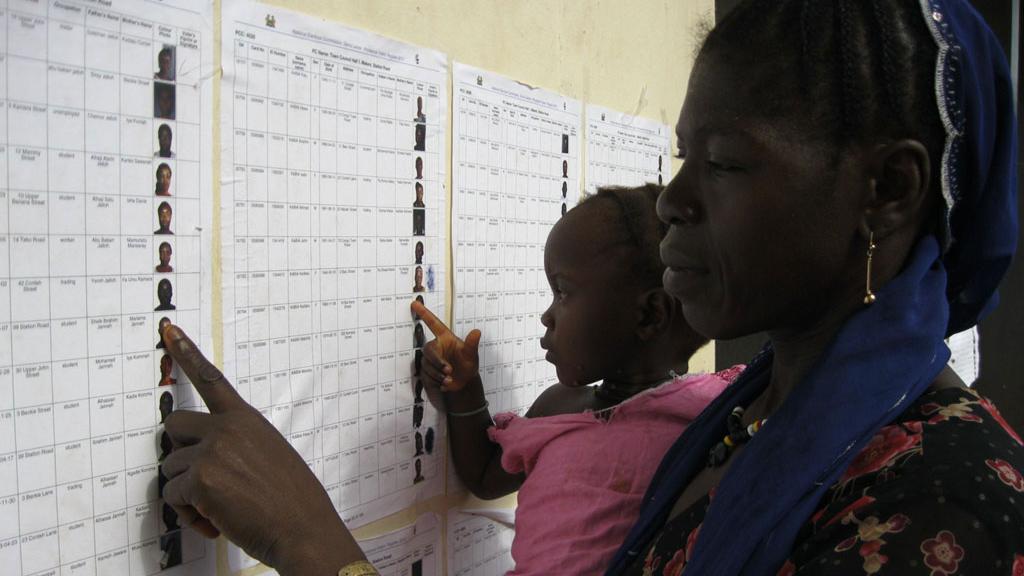 Mother and daughter checking a list